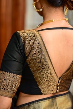 Black dupion deep V neck blouse with antique tone zari detailing. Deep V Neck Blouse, Fashionable Saree, Lace Blouse Design, Blouse Designs Catalogue, Latest Blouse Designs Pattern, Best Blouse Designs, Saree Blouse Neck Designs, New Saree Blouse Designs, Traditional Blouse Designs