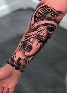 a person with a tattoo on their arm