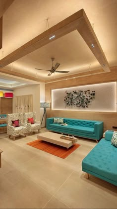 a living room filled with furniture and a ceiling fan