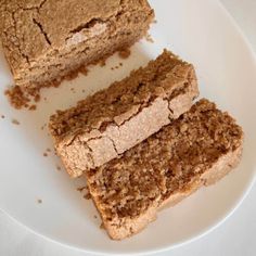 three pieces of brown bread on a white plate