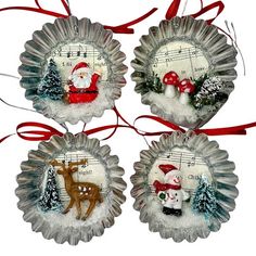 three christmas ornaments hanging from red ribbon on top of each other with musical notes and santa claus