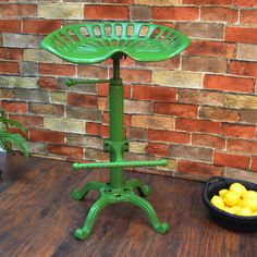 a green table that has some lemons on it