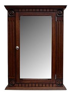 a wooden cabinet with a mirror on the top and bottom shelf above it, against a white background