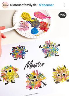 a paper plate with different colored monsters on it and the words monster painted on it