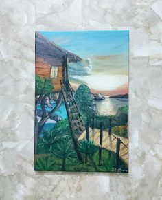 a painting on the wall of a house with stairs going up to an ocean and palm trees