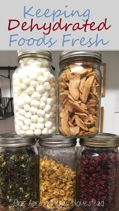 four jars filled with different types of food and one has marshmallows in them