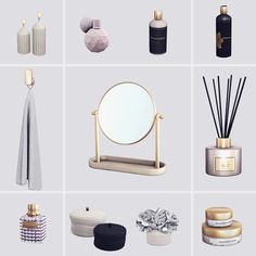 an assortment of bathroom items including soaps, candles, and other decorative objects on a gray background