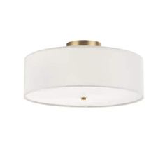 a ceiling light with a white shade on it