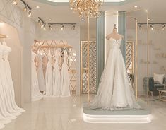 a wedding dress shop with mannequins and dresses on display