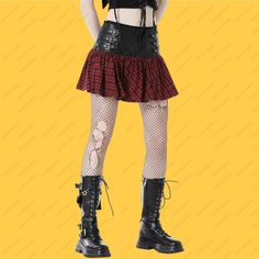 Women Gothic Short Red Plaid & Black Split Buckle Skirt Plus Tween Costume Women Gothic Short Red tartan and black leather-effect fabric. The skirt is detailed with buckle straps and has a zip fastening at the centre back. Comfort and fit are of utmost importance, and this skirt doesn't disappoint. With its adjustable buckles and elasticized waistband, it ensures a customized fit that flatters your figure and provides maximum comfort throughout the day or night. Pair this Women's Gothic Short Red Plaid & Black Split Buckle Skirt with a sleek black top or a lace-up corset, along with your favorite boots or stilettos, to complete a stunning and powerful ensemble. Whether you're attending a gothic club night, a music festival, or simply expressing your unique style on a casual outing, this sk Red Rock Style Mini Skirt, Rock Style Red Mini Skirt, Red Rock Mini Skirt, Fitted Punk Mini Skirt With Belt, Punk Style Fitted Mini Skirt With Belt, Red Mini Skirt For Alternative Fashion, Red Punk Style Skirt, Red Fitted Mini Skirt Punk Style, Red Fitted Mini Skirt For Alternative Fashion