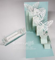 a close up of a card with a butterfly on it