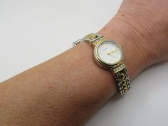 "J12 Ladies Beautiful Vintage Dress Watch with a nice clear vintage dainty dial looks from the early 90s By Sekonda Quartz watch No matter if you are looking to buy a watch for yourself or as a present, a vintage  piece is always the best choice!  No longer in production,  Tested over 48hrs and working to correct time. cleaned and serviced. it will hold it's value, and may even increase in price. Don't hesitate! Will fit up to 7.4\" approx  can be downsized with removal of links New Battery fitted total face  including winder 25.05 mms \"Please see photographs for condition  All the watches are pre owned unless stated otherwise,  they are not new watches & therefore please expect them to be in used condition,  this may include some scratches & or marks etc. Watch is in working condition\"" Sekonda Watch, Watch Gift, Early 90s, Dress Watch, Two Tone Watch, Watch Gifts, Women Wrist Watch, Vintage Dress, Vintage Watches