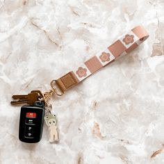 ✱ D E S C R I P T I O N ✱ Looking for something that helps keep track of your keys without actually holding it in your hands? This handy wristlet keychain's got you covered :) The lobster clip makes it super easy to attach keys, cardholders, loyalty cards and other keychains directly onto it.  Each keychain design is illustrated by me in my studio and sent to production.  ✱ S I Z E S & M A T E R I A L S ✱ Double-sided design. Approximate dimensions of wristlet lanyard: 7" inches (length) Approximate length of entire keychain: 8.5" inches Colors may appear different on your computer monitor or device screen!! ✱ F I N D   M E    H E R E ✱  Instagram: https://www.instagram.com/peachypaperstudio/ Wristlet Lanyard, Checkered Flower, Loyalty Cards, Girly Car, Lanyard Keychain, Keychain Design, Loyalty Card, Wristlet Keychain, Happy Face