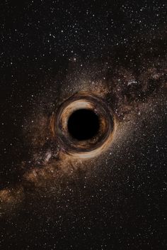 a black hole in the sky with stars around it