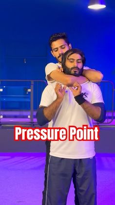 two men standing next to each other with their arms around one another and the words pressure point in front of them