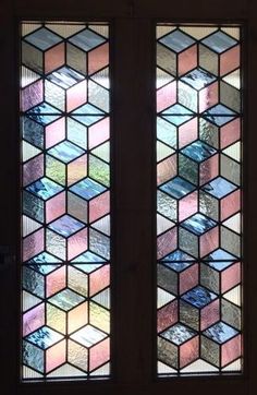 two stained glass windows with different colors