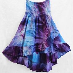 Fantastic Tie-Dye Ruffled Hi-Lo Skirt Can Also Be Worn As A Top! Brand New From Importer, Available In Small, Medium And Large. Beautiful Blues & Purples, Fun & Flirty And Extremely Comfortable. Light Weight, Soft And Flowy, 100% Rayon Fabric. Elastic Top Stretches To Fit Without Binding Or Rolling. Skirt Is About 21 Inches In Front To 33 Inches In Back. Gentle Wash, Drip Dry Recommended. Purple Tiered Maxi Skirt For Summer, Purple Flowy Maxi Skirt For Beach, Beach Purple Flowy Maxi Skirt, Purple Flowy Maxi Skirt For The Beach, Flowy Purple Maxi Skirt For Beach, Purple Flowy Skirt For Summer, Flowy Purple Skirt For Summer, Tie Dye Tiered Skirt For Summer, Purple Flowy Maxi Skirt For Vacation