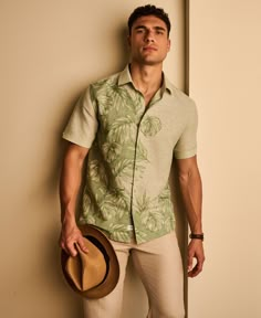 This Cubavera men's short sleeve button-down delivers sophisticated style with a tropical twist. Rendered in two-toned chambray material, it features an engineered tropical print for a unique look. This men's pattern shirt is made from a comfortable and breathable linen-cotton blend fabric that's perfect for warm weather, and can be easily dressed up or down to suit the occasion. 64% Linen / 36% Cotton Classic Fit Breathable Linen-Cotton Blend Fabric Two-Toned Chambray Fabrication Point Collar For A Polished Look Engineered Tropical Print Adds Eye-Catching Style Short Sleeves Machine Wash Imported | Cubavera Men's Engineered Tropical Print Short Sleeve Shirt in Basil Green, Size Medium, Linen Blend Tropical Mens Fashion, Tropical Groomsmen Attire, Aj Aesthetic, Tropical Print Outfit, Dr Wedding, Night Dinner Outfit, Tropical Accessories, Tshirt Details, Clothing Manufacturing