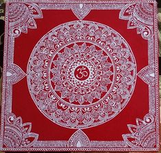 an intricately designed red and white paper with the omastha symbol on it