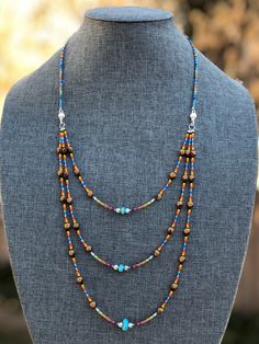 Turquoise Multi-strand Jewelry With Tiny Beads, Artisan Multi-strand Jewelry With Tiny Beads, Bohemian Lariat Necklace With Tiny Beads, Bohemian Lariat Jewelry With Tiny Beads, Bohemian Multi-strand Jewelry With Tiny Beads, Turquoise Heishi Beads Jewelry With Beaded Chain, Bohemian Multi-strand Spacer Beads Jewelry, Bohemian Oval Beads With Beaded Chain, Bohemian Oval Czech Glass Beads