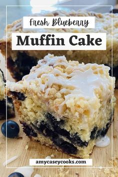 fresh blueberry muffin cake on a cutting board with the words fresh blueberry muffin cake above it