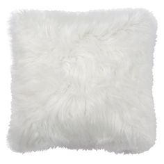 a white furry pillow on a white background