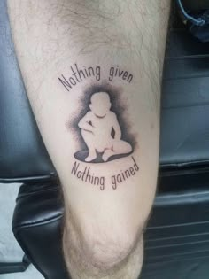 a man with a tattoo on his leg saying nothing given nothing game