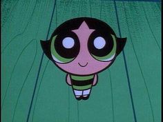 the powerpuff character is hanging upside down in the air with her eyes wide open