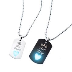 two necklaces with the words, his queen and her king glowing in blue light