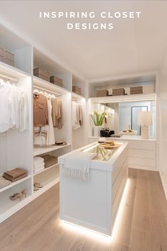 a white closet filled with lots of clothes