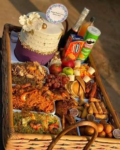 a basket filled with lots of food on top of a table