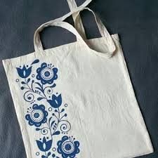 a white bag with blue flowers on it