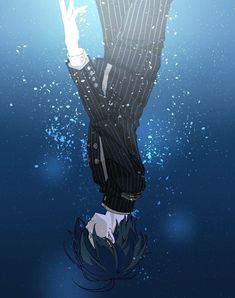 a man in a suit and tie standing under water with his hand up to the sky