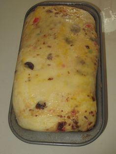 an uncooked casserole dish sitting on top of a stove