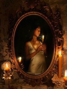 a painting of a woman holding a candle in front of a mirror with candles around it