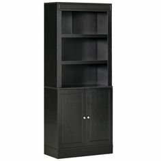 a tall black bookcase with two doors