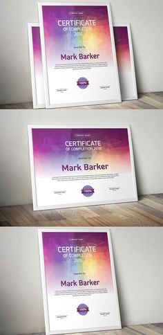 three certificates on top of each other in front of a white wall with wood flooring