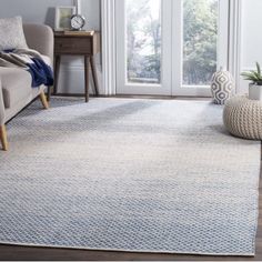 a living room scene with focus on the rug