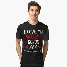 a man wearing a t - shirt that says i love my awesome mom