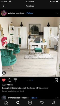 an instagram photo of a living room with green velvet chairs and gold accents on the walls