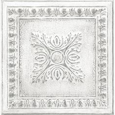 a white square with an ornate design on it