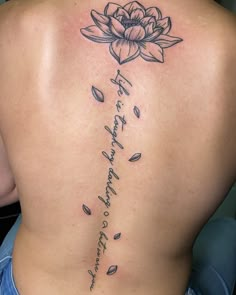 Lotus Flower Elegant Spine Tattoo Ideas For Women Name Down Spine Tattoo, Mother Daughter Spine Tattoo, Back Christian Tattoo, Badass Spine Tattoos For Women, Spinal Tattoo Women Ideas, Bible Verse Spine Tattoo, Elegant Spine Tattoos For Women, Spine Tattoos With Meaning, Spinal Tattoo Women