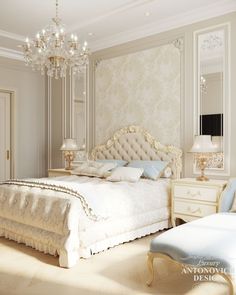 an elegant bedroom with white furniture and chandelier