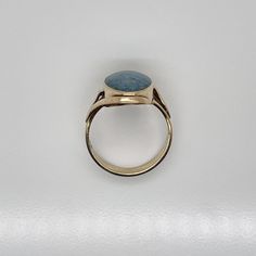 A very fine vintage gold and opal signet style ring.  With oval opal doublet cabochon bezel set in 9ct gold.   Simply a great ring!  Date: 20th Century  Overall Condition: It is in overall good, as-pictured, used estate condition with some very fine & light surface scratches and other signs of expected light wear consistent with age.  Fineness: Marked 9ct for gold fineness.    Marks: 9ct  Measurements: Height: ca. 23 mm Length: ca. 17 mm Width: ca. 19 mm  Weight: ca. 3.5 grams  Ring Size: 6.75 Bezel Setting, Vintage Gold, 20th Century, Opal, Ring Size, Size 6, Signs, Ring, Gold