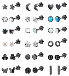 a bunch of different types of studs and piercings on a white back ground