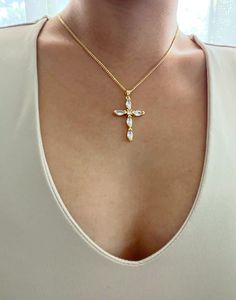 This cubic zirconia cross truly looks like real diamonds and sparkles beautifully. Picture and video does not emit how sparkly this cross looks. Cross is hung from a modern and casual chain for the perfect every day design! Necklace comes in a more casual 18k gold plated chain or a daintier 14k gold filled chain for a more elegant look. It is of great importance to me that I make jewelry for my customers that I, myself, wear every day. Each jewelry piece is handmade by me personally with love an Chunky Cross Necklace, Pearl Cross Necklace, Perfume Body Spray, Necklace Cross, San Gabriel, Religious Cross, Gold Cross Necklace, Necklace Chunky, Necklace Statement