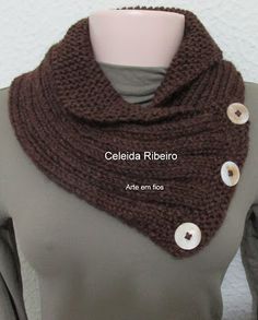 a knitted cowl with buttons on it