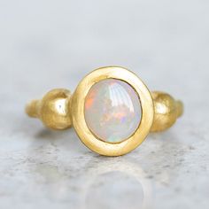 Our ancient inspired Talisman Ring has been set with a semi black opal from Lightning Ridge. Opal measures 9 x 8mm. Band width 2.5mm at back. Metal weight 11g approx. This ring is a size O in 14ct yellow gold with a matte finish. For a high shine finish, please leave a note at checkout. Please note, we can resize 1-2 sizes up or down. Talisman Ring, Lightning Ridge Opal, Lightning Ridge, Instagram Icons, Black Opal, Jewelry Inspo, Opal, Yellow Gold, Band