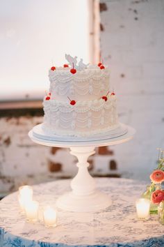 a white cake sitting on top of a table