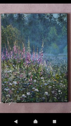 an image of a painting on the wall with flowers and trees in the back ground